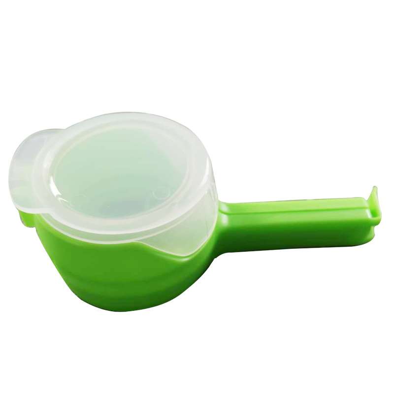 Green food bag clip with pouring spout, product color photo